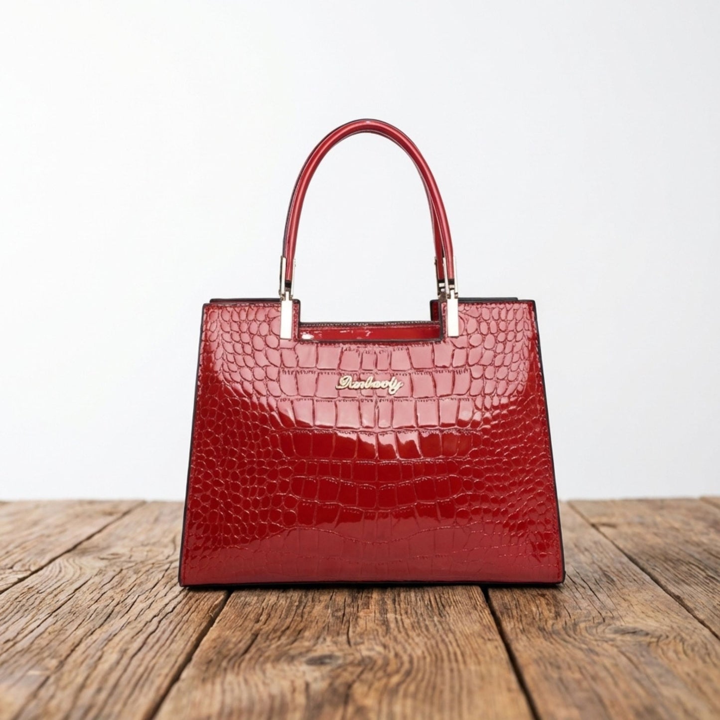 Shiny crocodile handbag