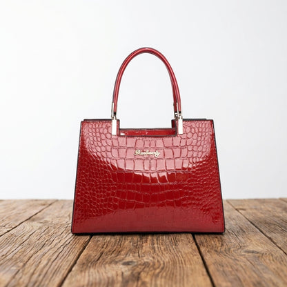 Shiny crocodile handbag