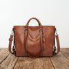 Sign | "Large leather shoulder bag".