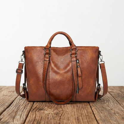 Sign | "Large leather shoulder bag".