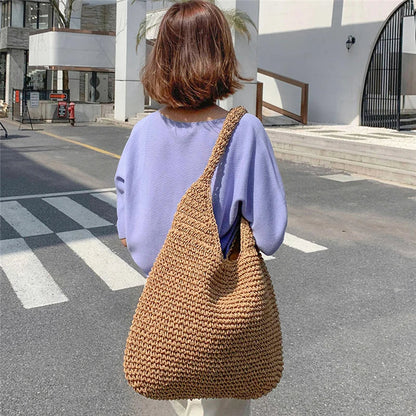 Casual shoulder bag in woven straw-Elly Rose