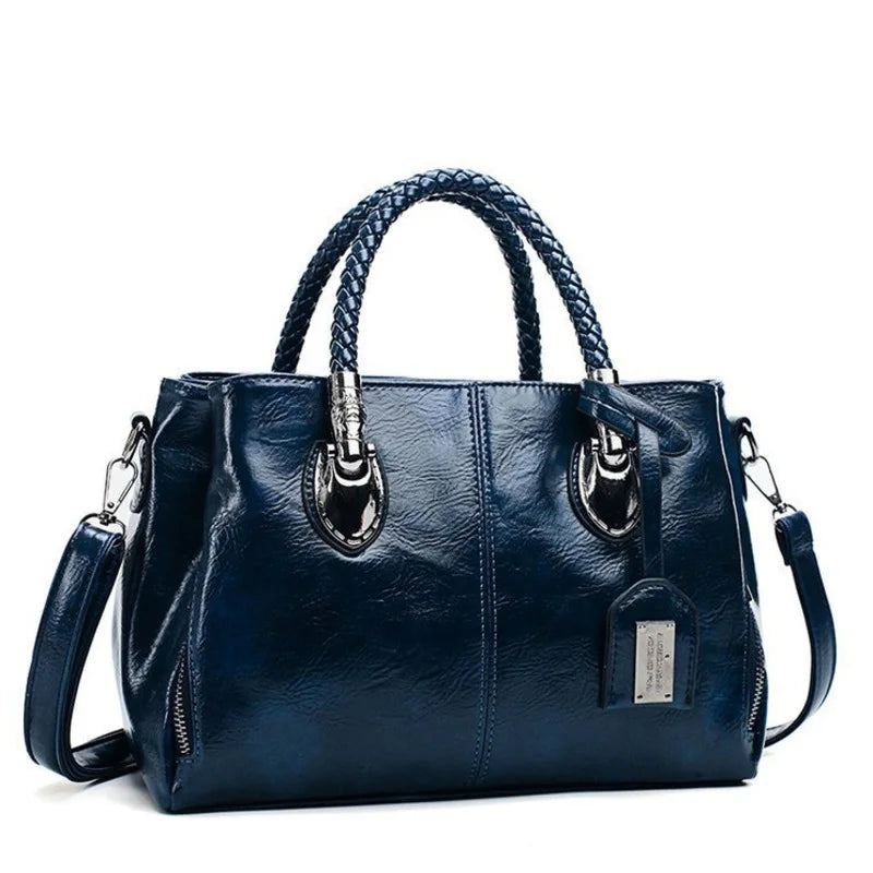 Pia | "Elegant leather handbag with braided handle".-Elly Rose