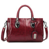 Pia | "Elegant leather handbag with braided handle".-Elly Rose