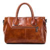 Pia | "Elegant leather handbag with braided handle".-Elly Rose