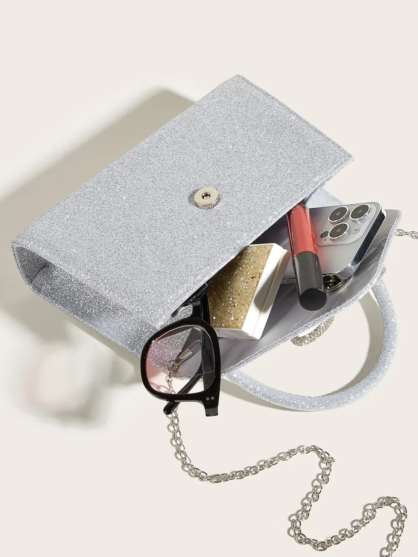 Sophie Glow satin evening clutch bag-Elly Rose