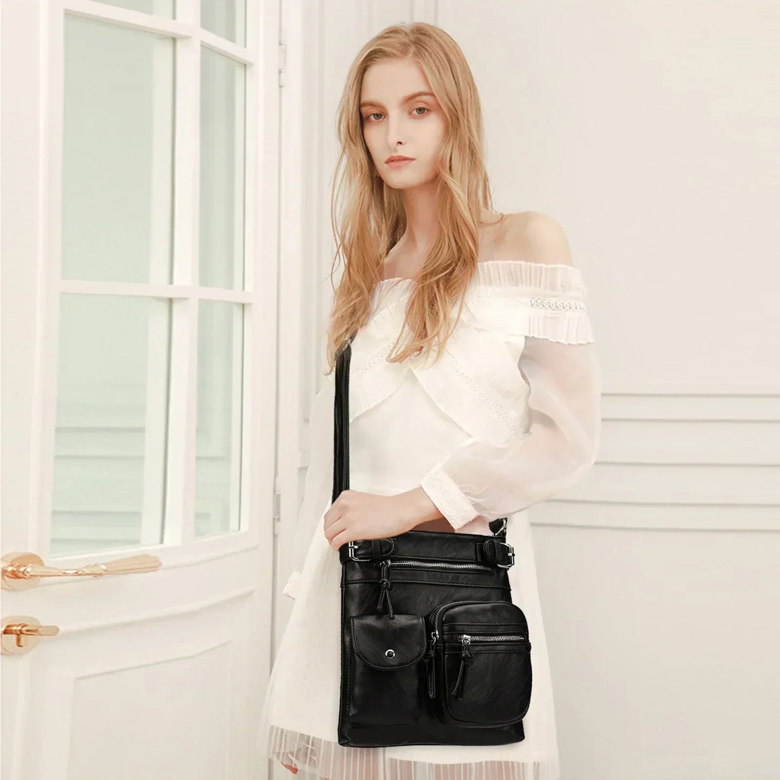 Zara | Soft leather shoulder bag with multiple compartments.-Elly Rose