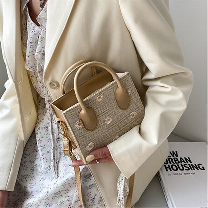 Woven handbag with floral accents - Serena-Elly Rose