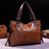 Augusta | Soft leather bag with two handles and elegant details.-Elly Rose